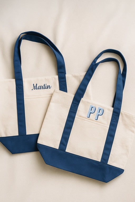 Custom embroidered canvas tote bags with monogram and name in navy blue, handmade in Lakewood Ranch FL